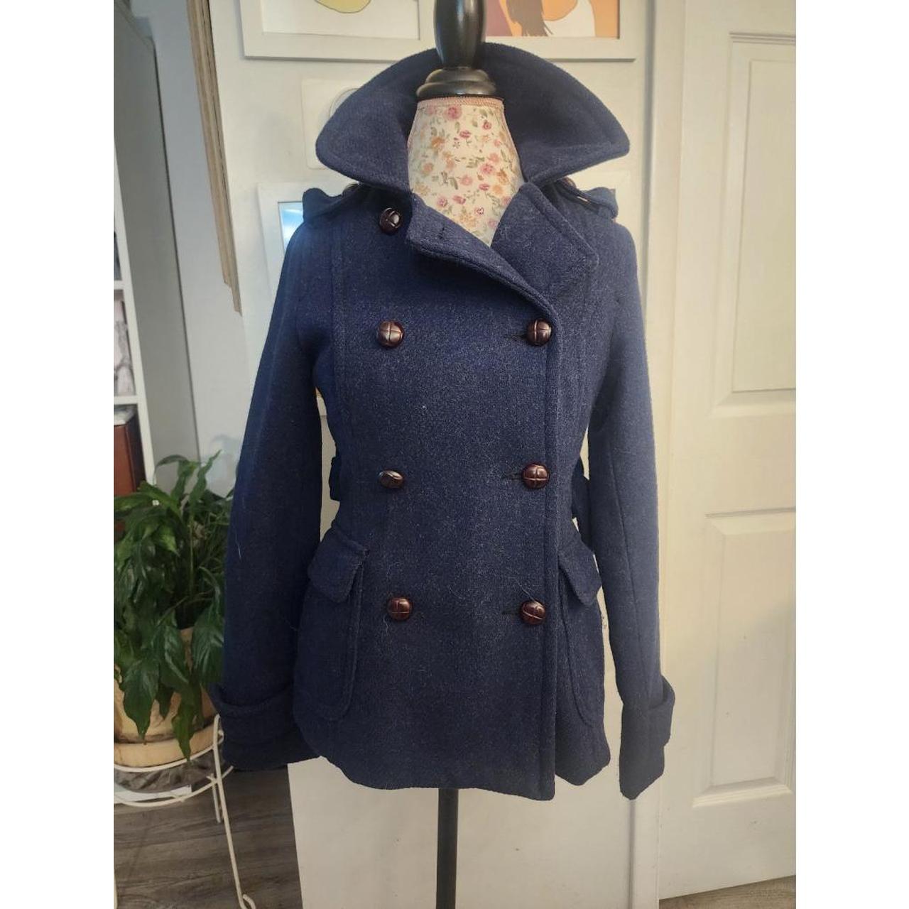 This is a beautiful wool blend peacoat. Size is a Depop