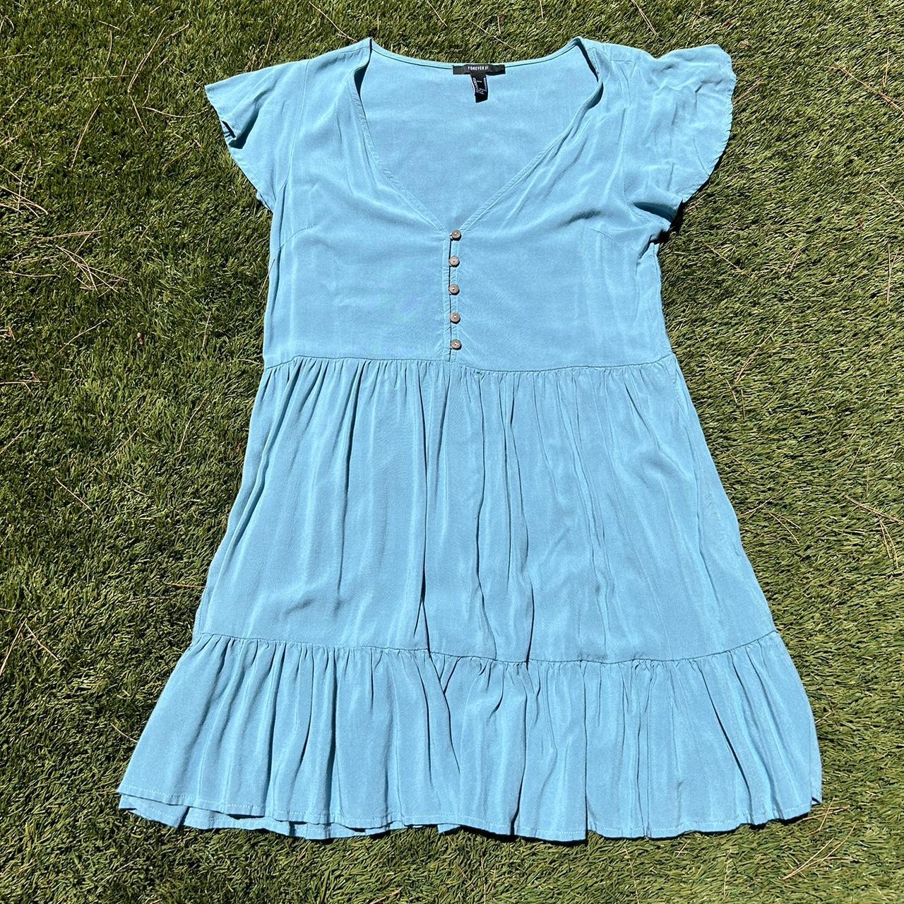 Blue babydoll dress with buttons down the front and... - Depop