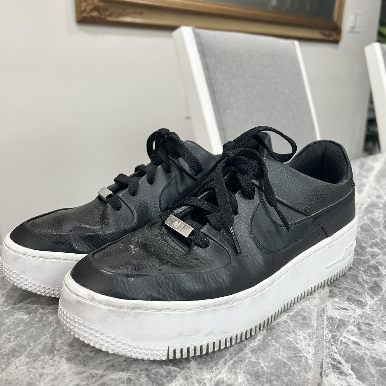 Nike black air 2024 force 1 sage trainers