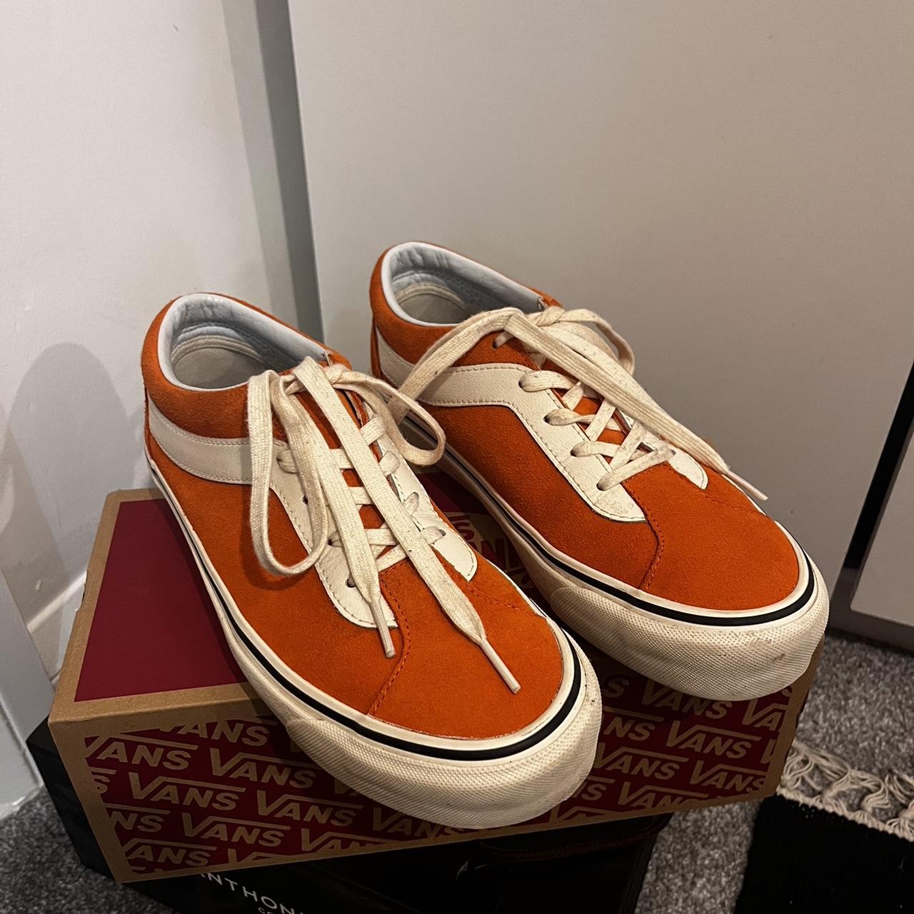 Orange vans low top deals