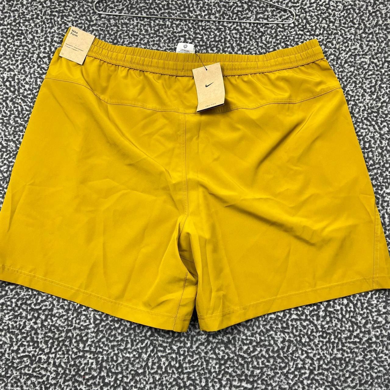 Mustard yellow nike shorts best sale