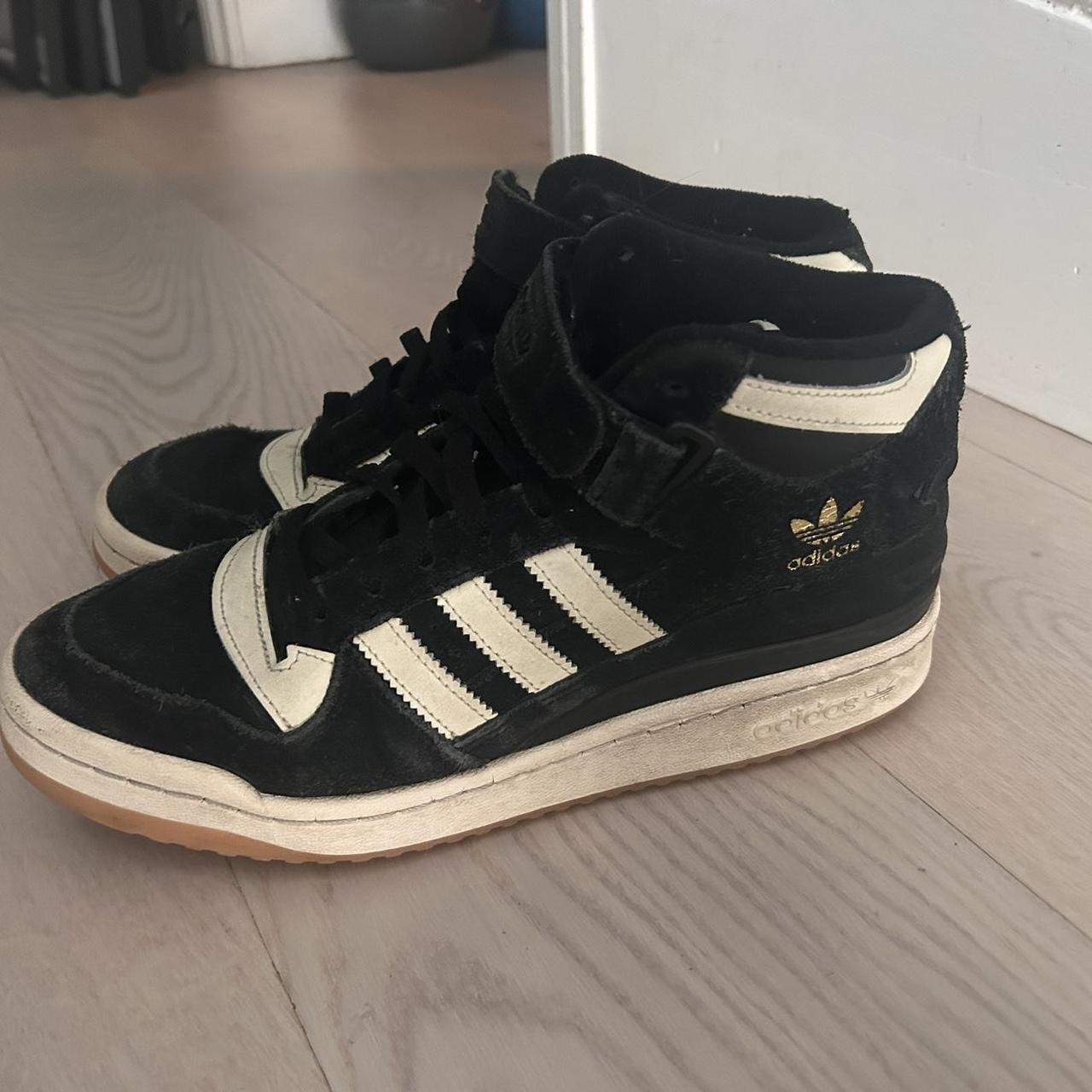 Adidas black mid tops on sale