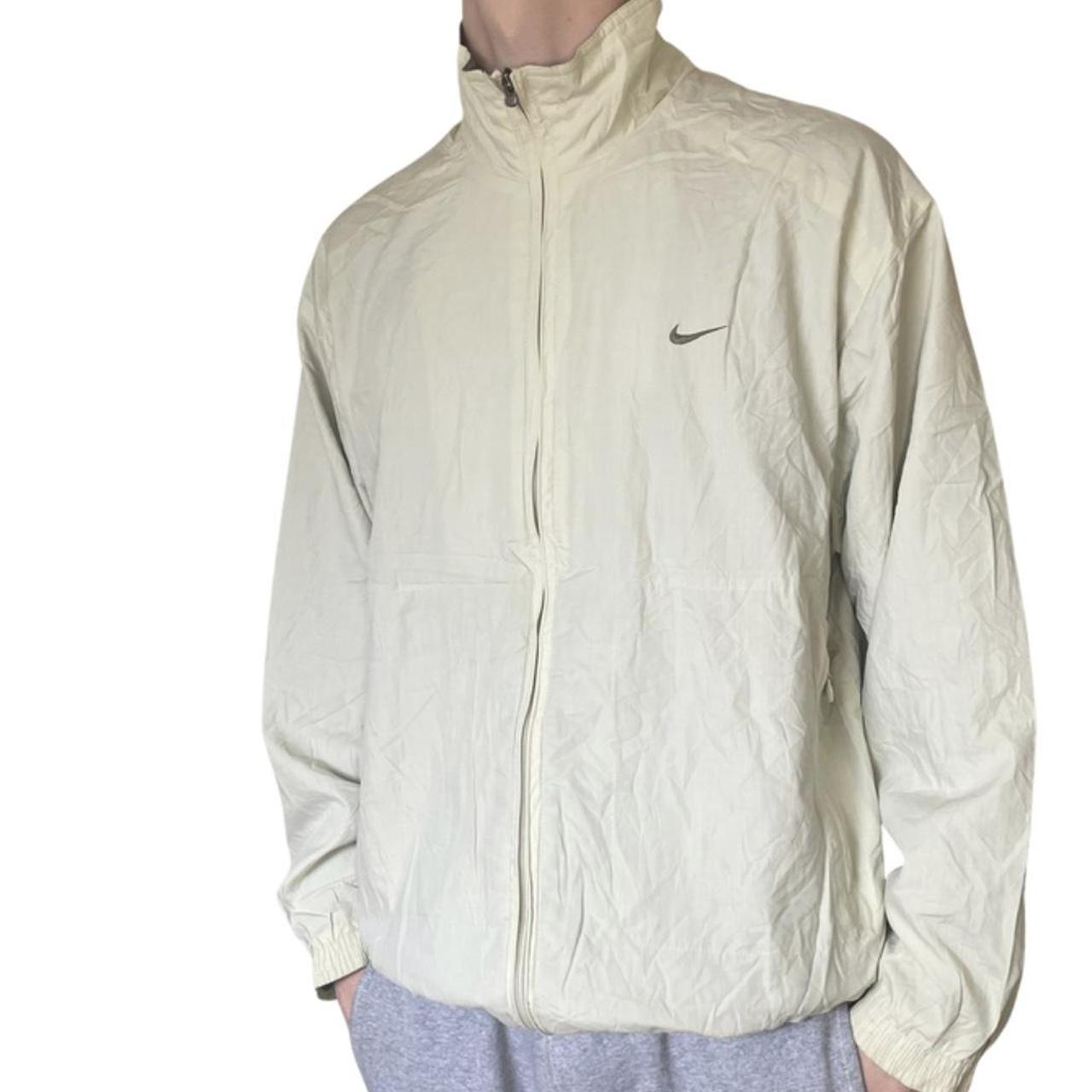 cream nike top