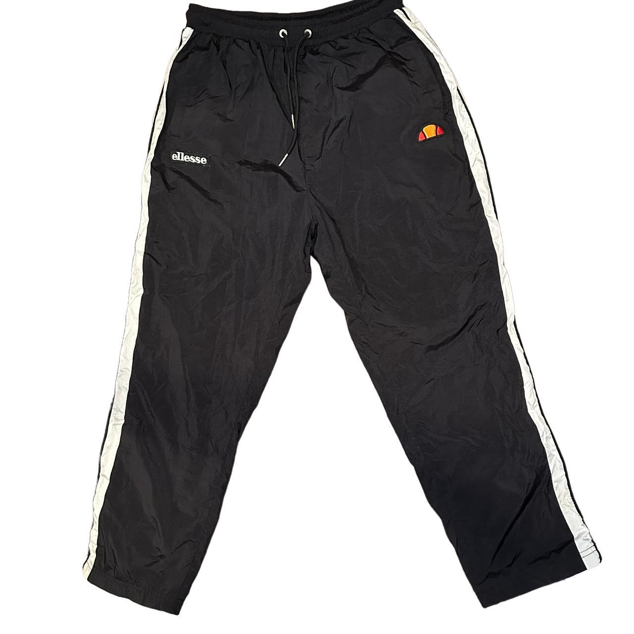 Ellesse black nylon sweatpants, kids size large,... Depop