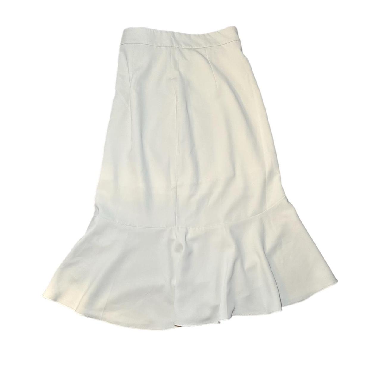 Long maxi skirt, color cream with a small slit, size... - Depop