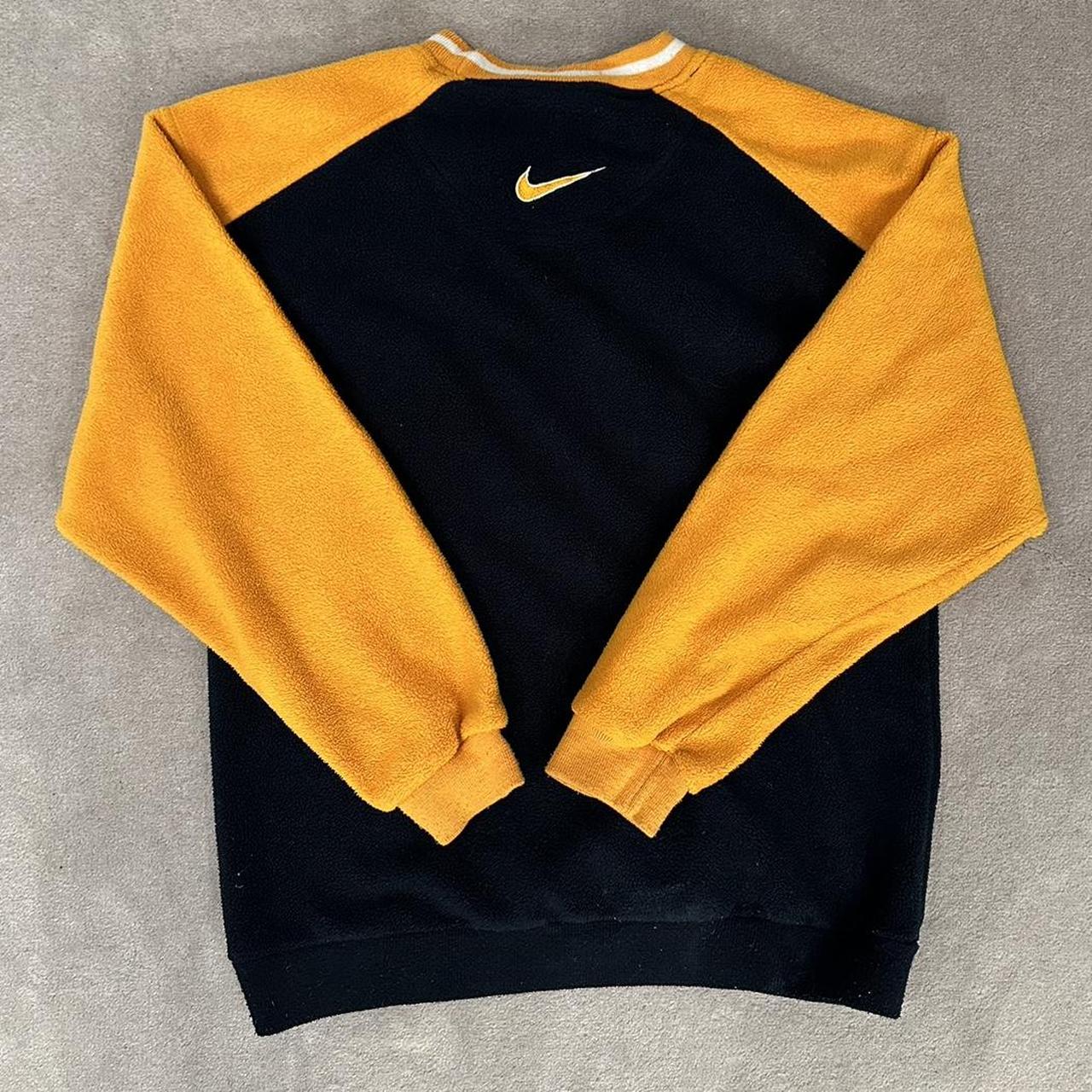 Vintage Nike blue and gold fleece roundneck... - Depop