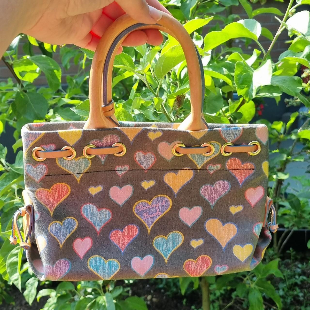 Stunning dooney and burke small handbag with hearts.... - Depop 