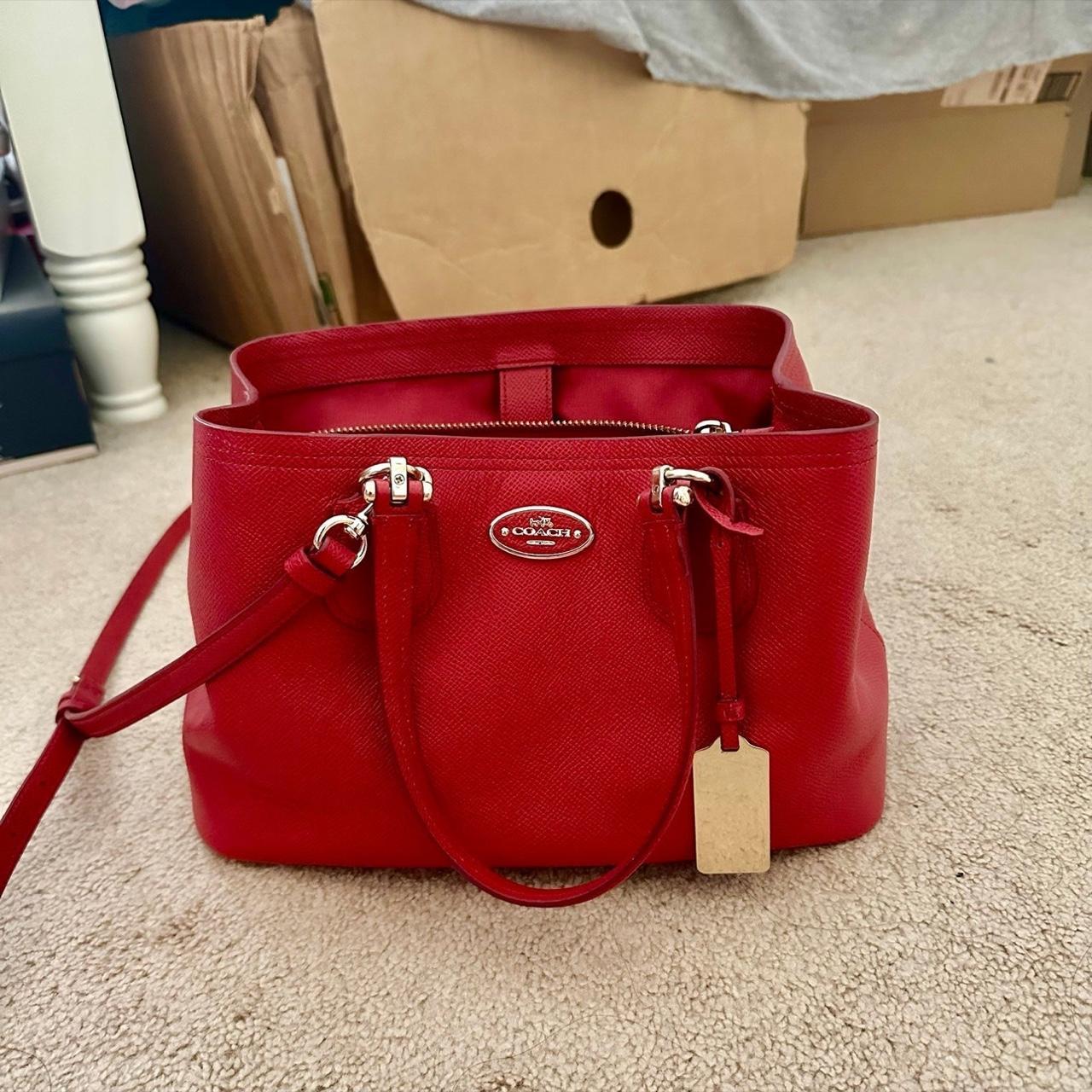 Gently used red convertible Coach small Kitt