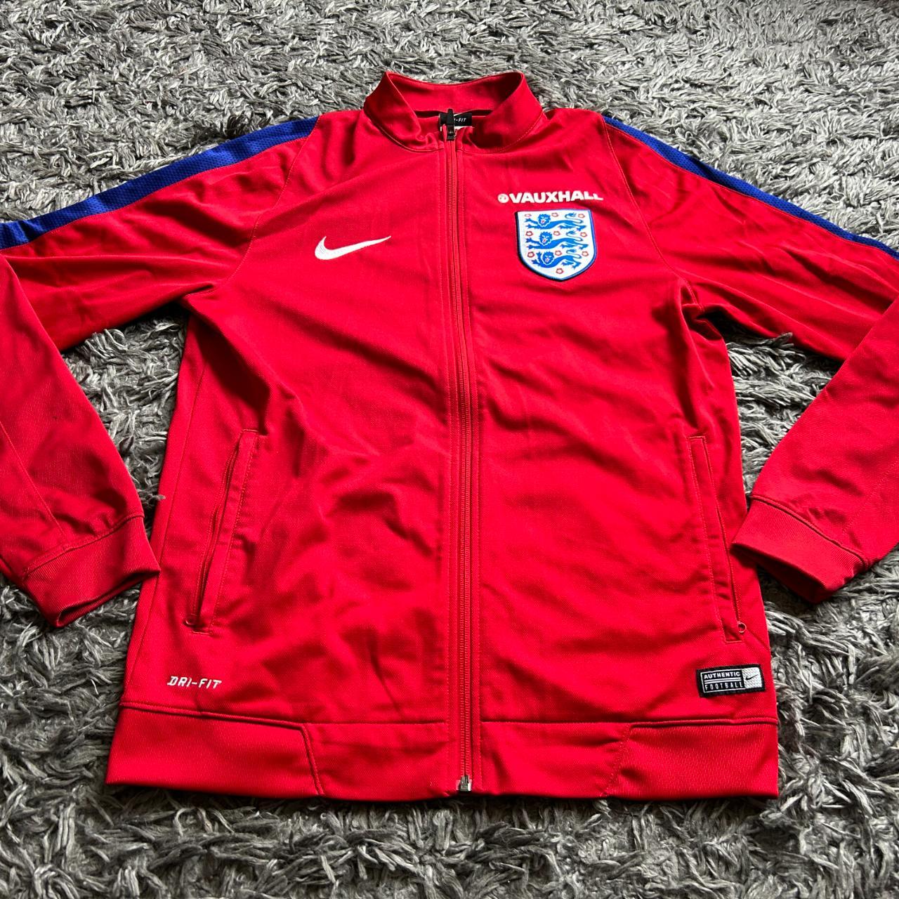 red nike tracksuit top