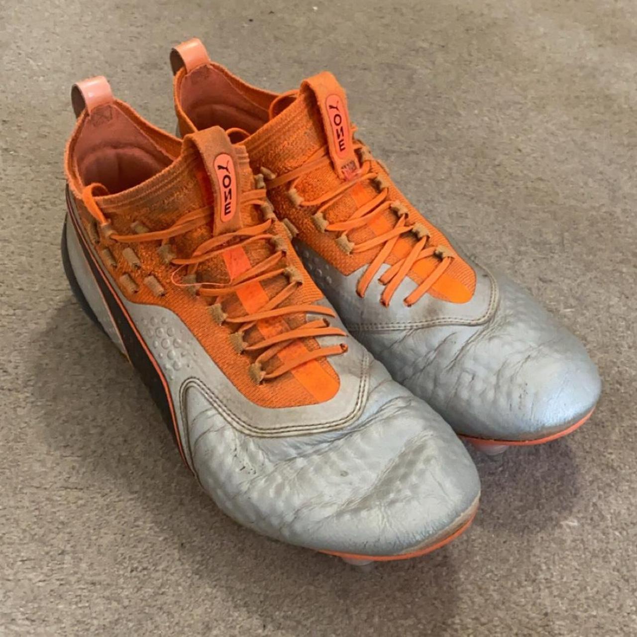 Puma one football boots orange silver Fairly used. Depop