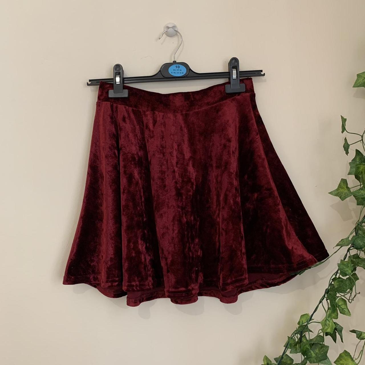 Red velvet skater skirt from Primark in a size... Depop