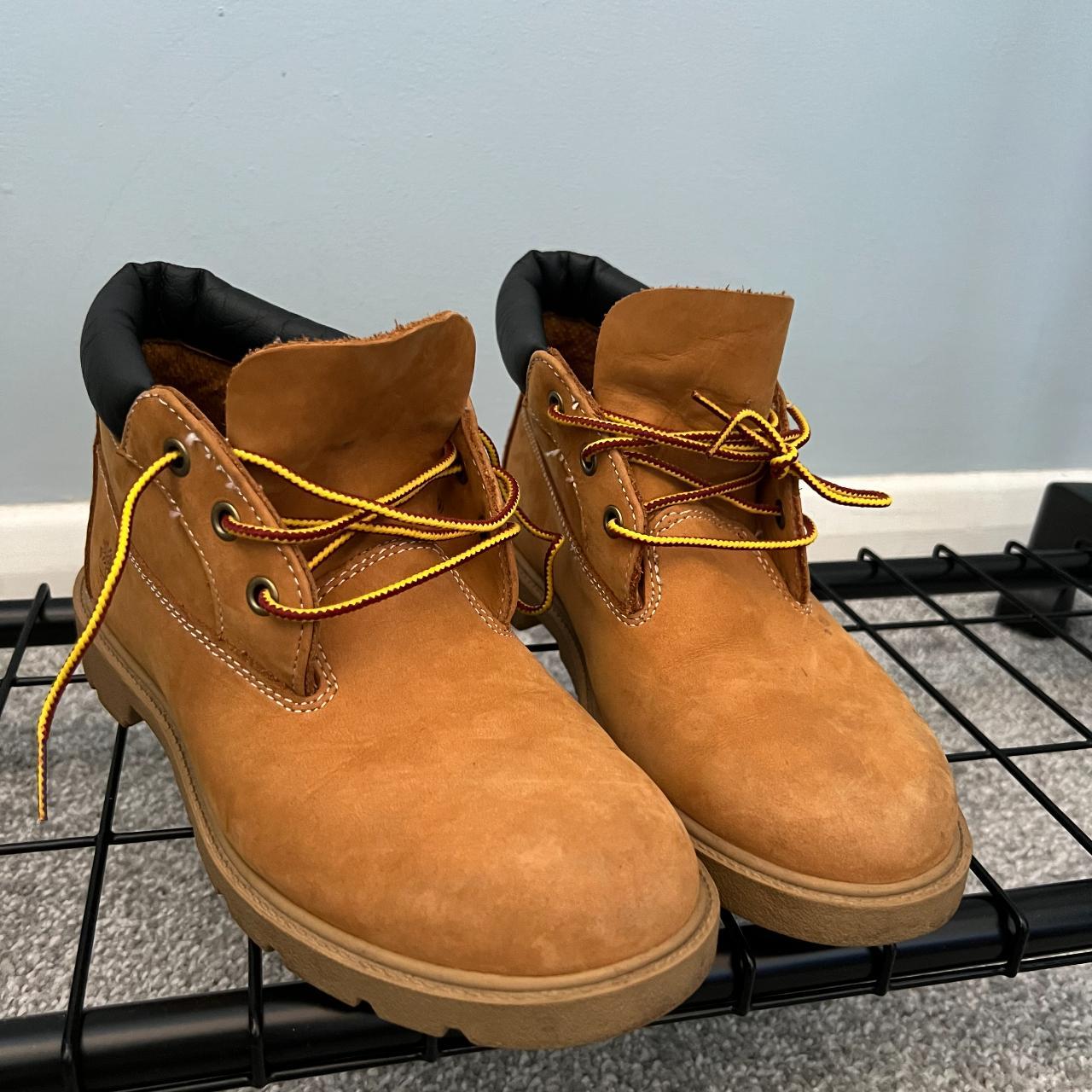 Yellow waterproof Timberland boots. In very good