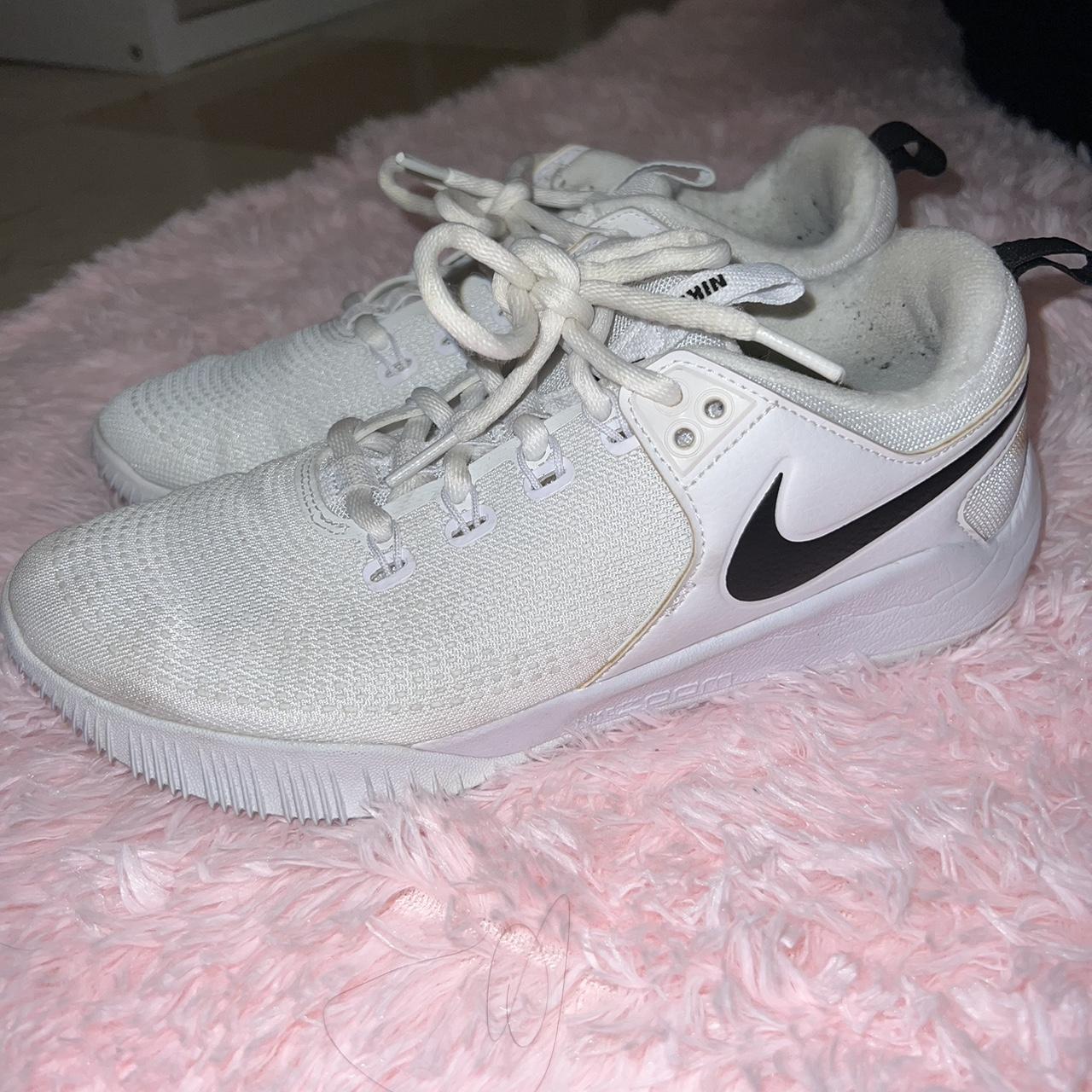 half white half black nike shoes