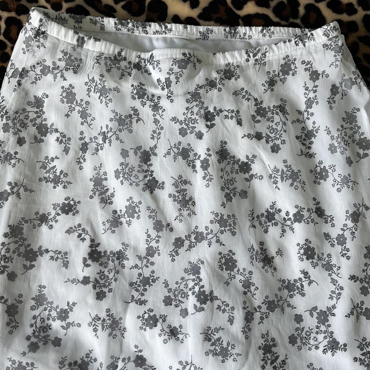 White mesh skirt with black floral design. Bought it... - Depop