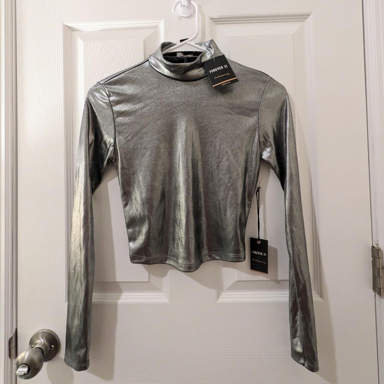 Silver shimmery turtleneck Size XS New with... - Depop