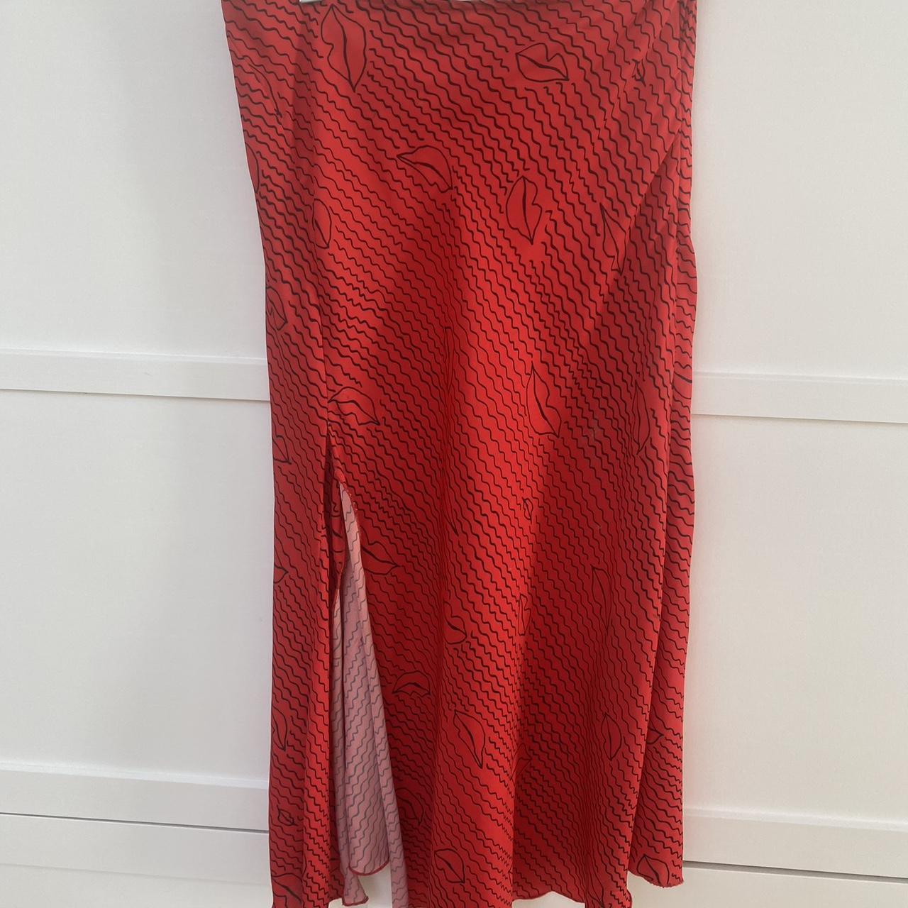 Chosen midi skirt in red with lips and a slit on the... - Depop