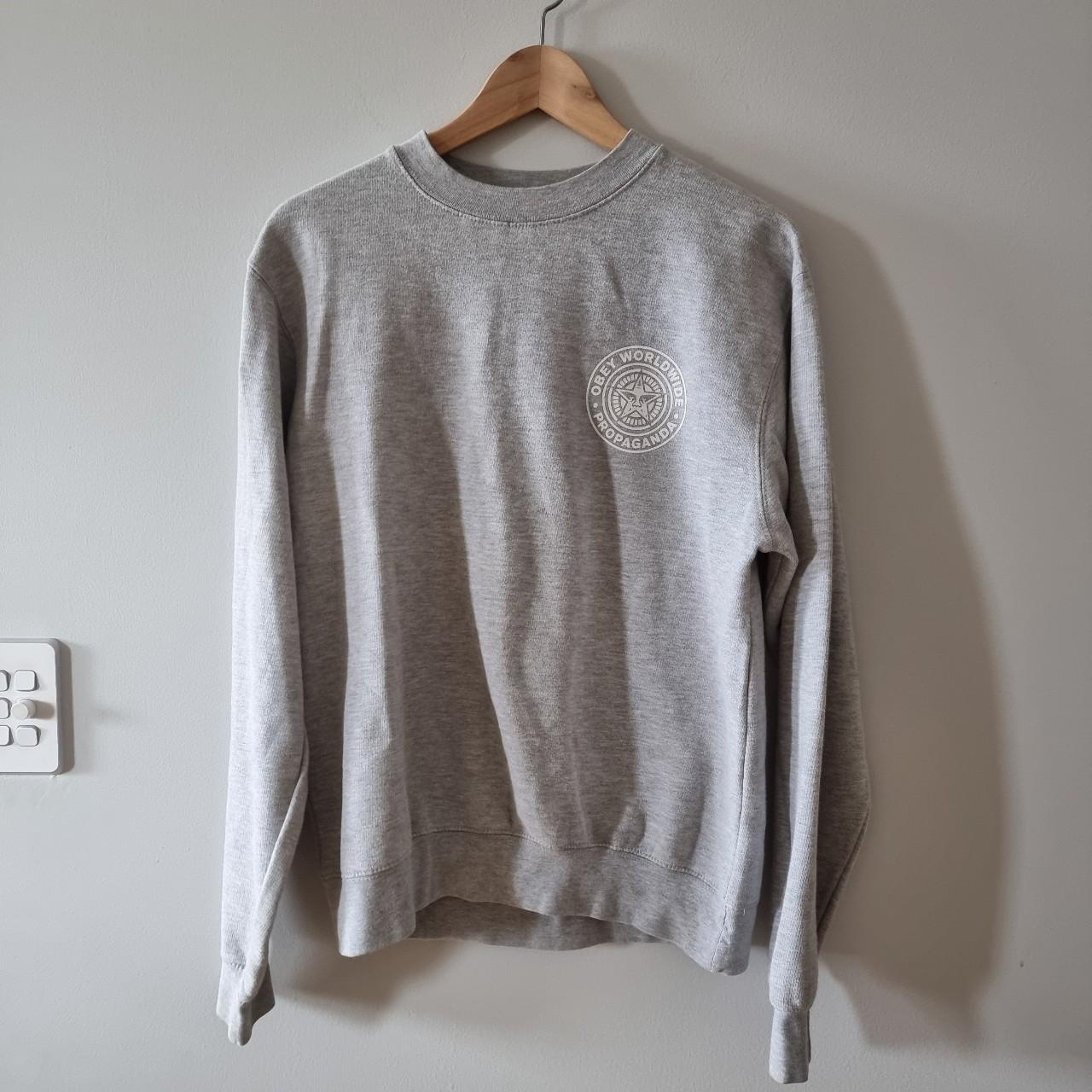 Obey Propaganda Grey Jumper with small logo on front. Depop