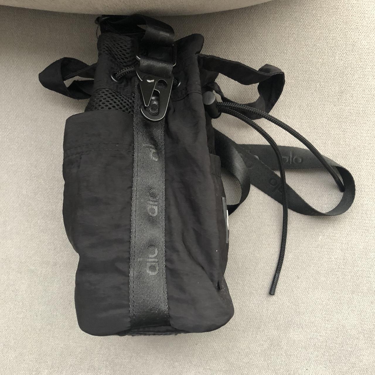 Alo Yoga Cross Body Bucket Bag Black Good pre-owned - Depop