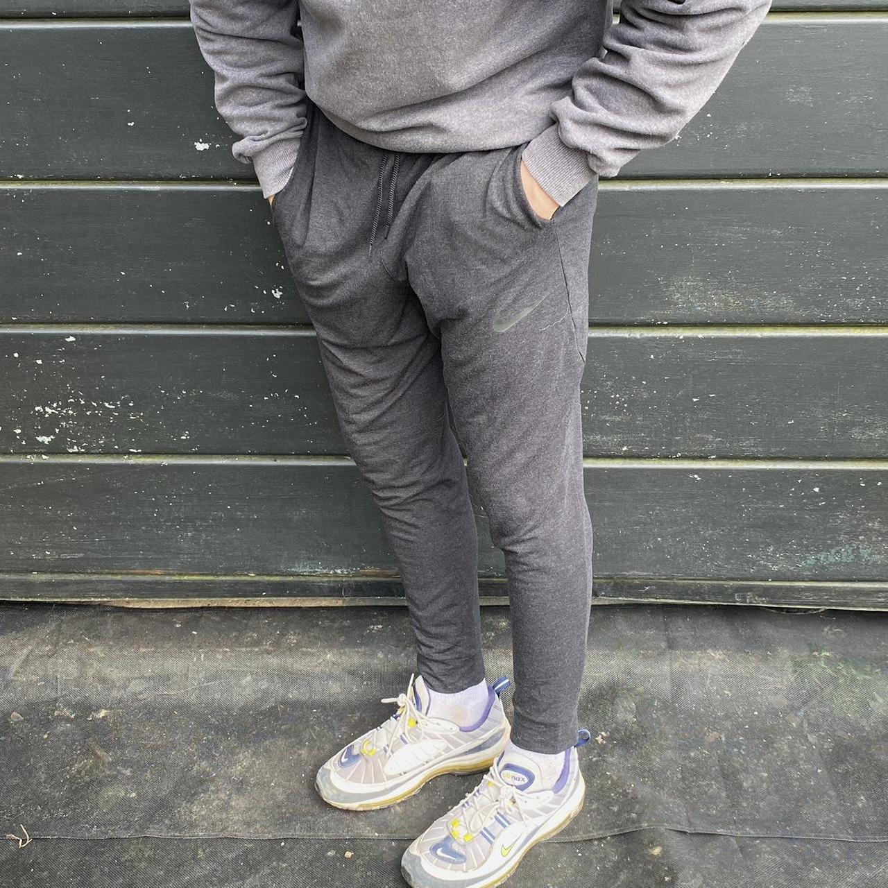 grey and black nike tracksuit