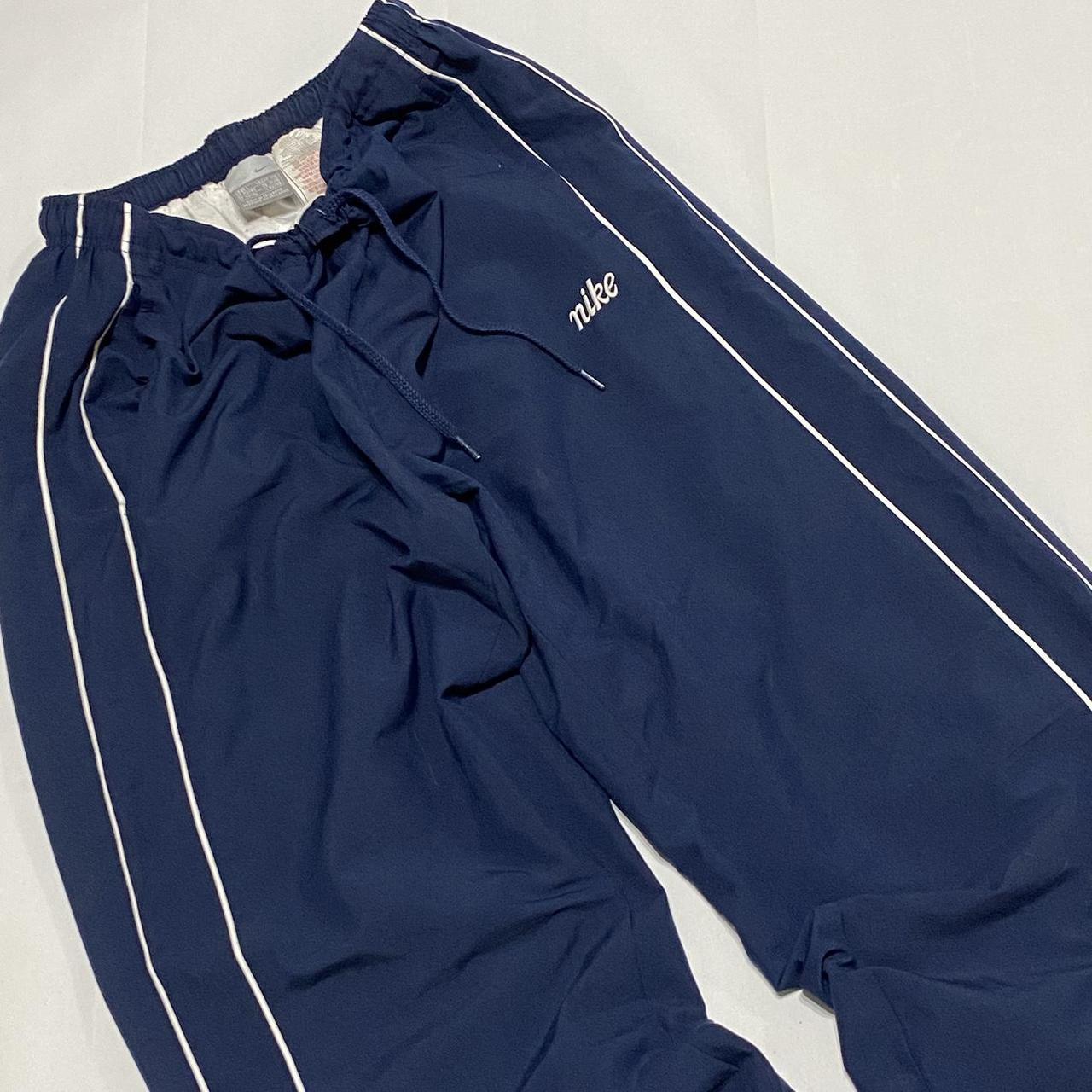 Vintage navy Nike tracksuit bottoms / track pants... - Depop