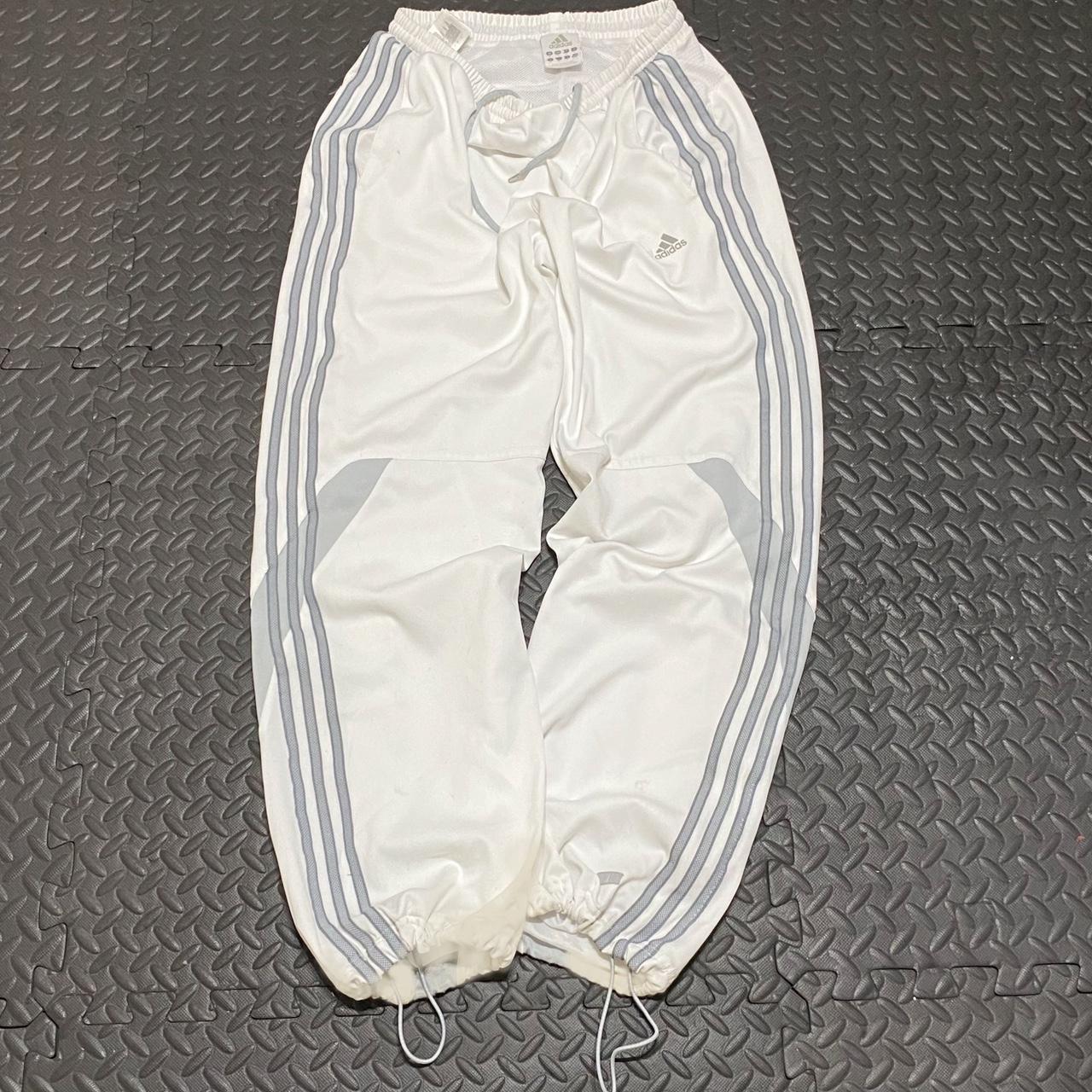 Vintage white adidas tracksuit bottoms / track pants... - Depop