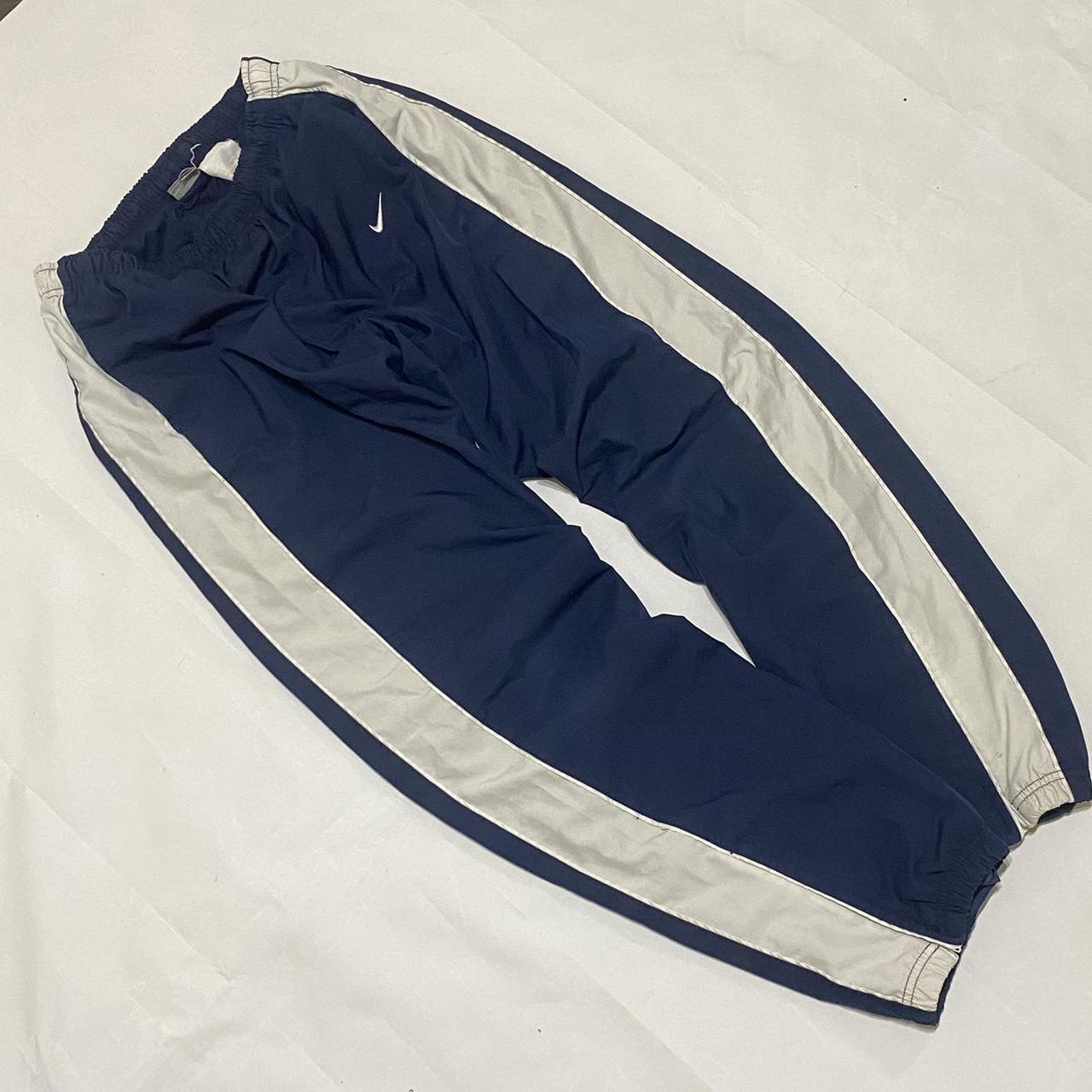 Vintage navy Nike tracksuit bottoms / track pants... - Depop