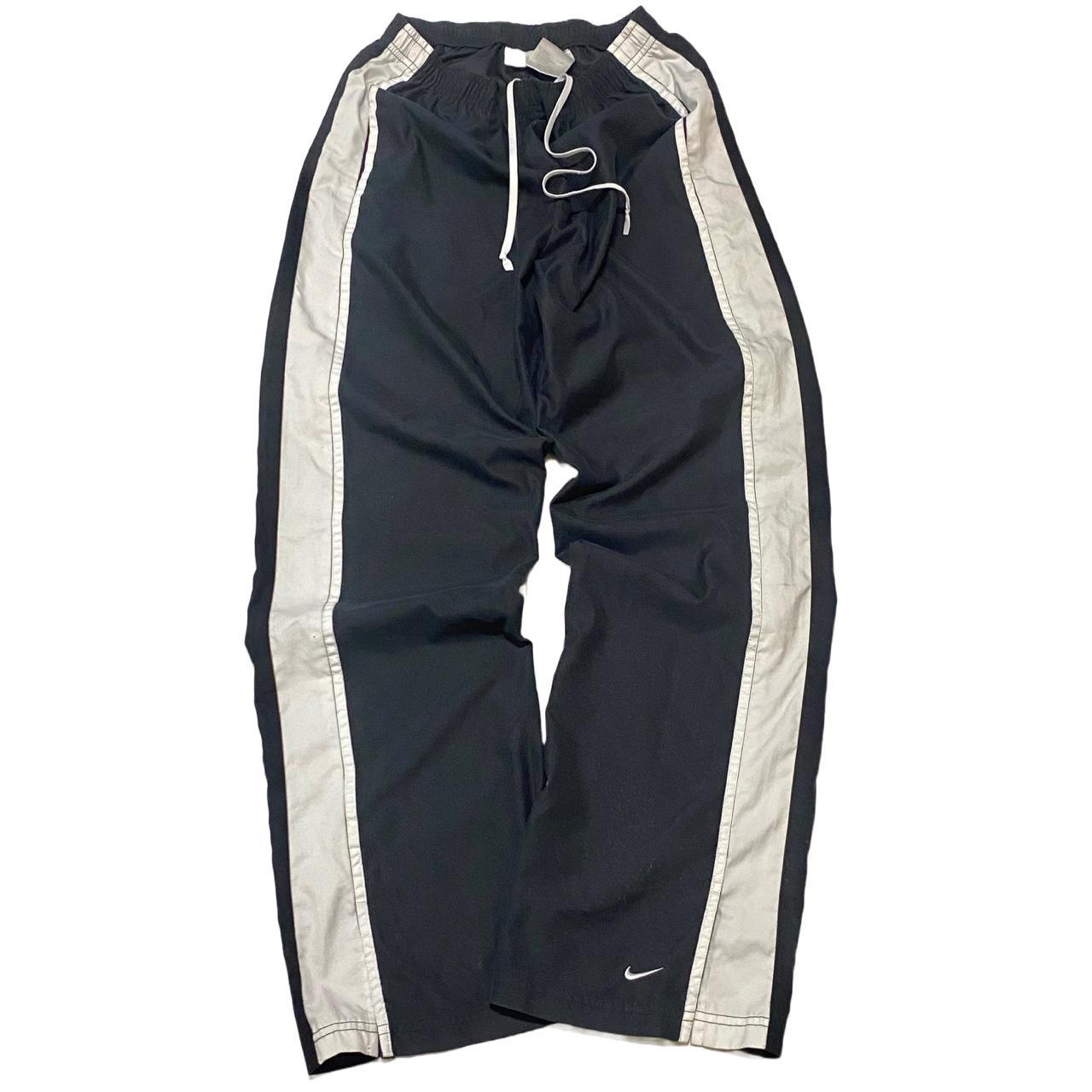 Vintage black woman’s Nike tracksuit bottoms / track... Depop