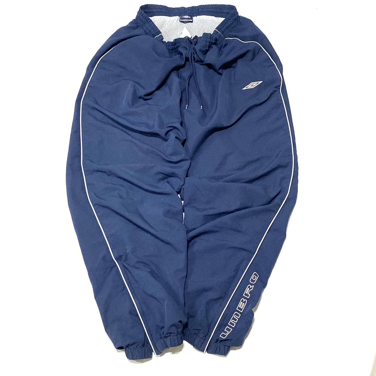 Vintage navy cuffed Umbro tracksuit bottoms / track... Depop