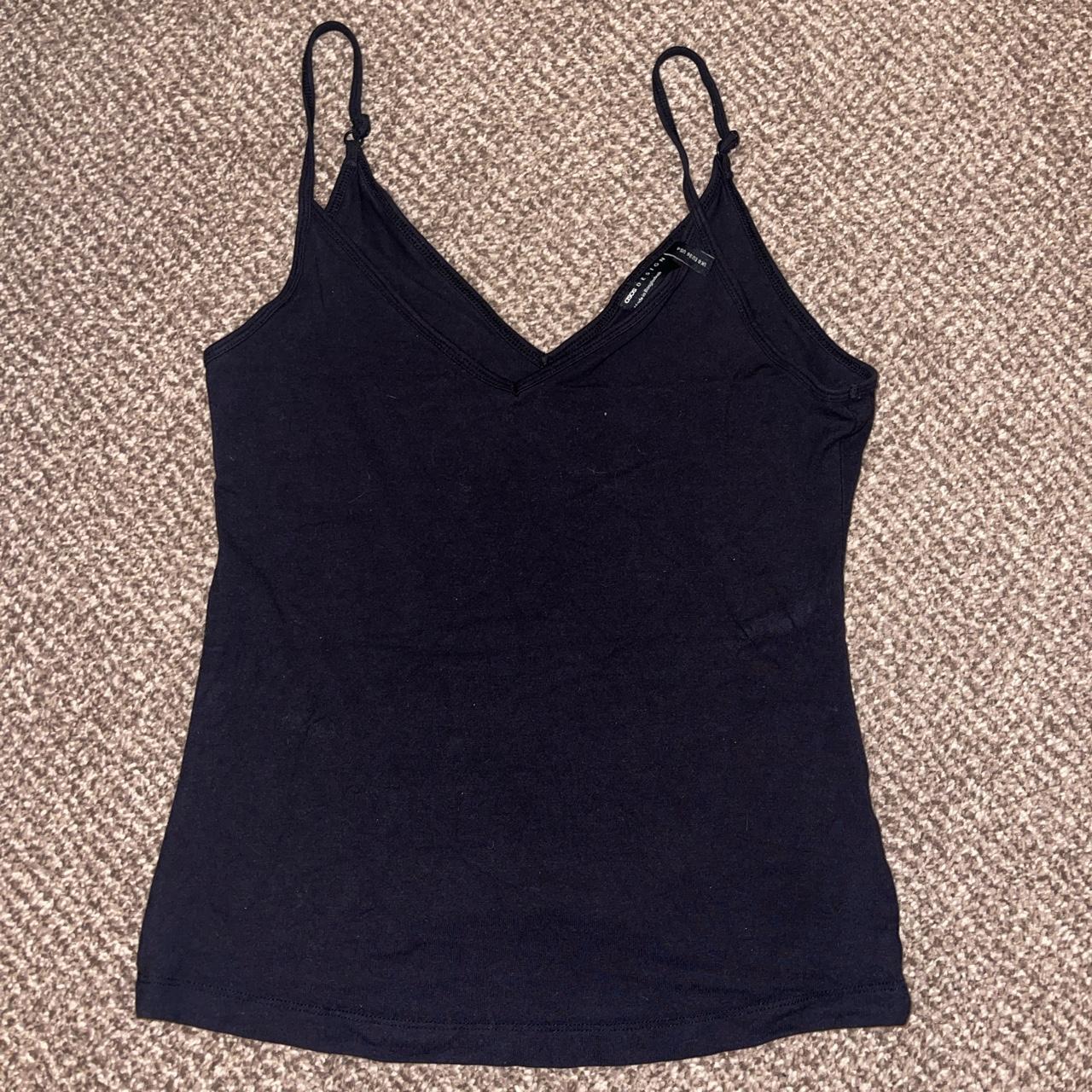 Plain black tank top with adjustable straps. Like new - Depop