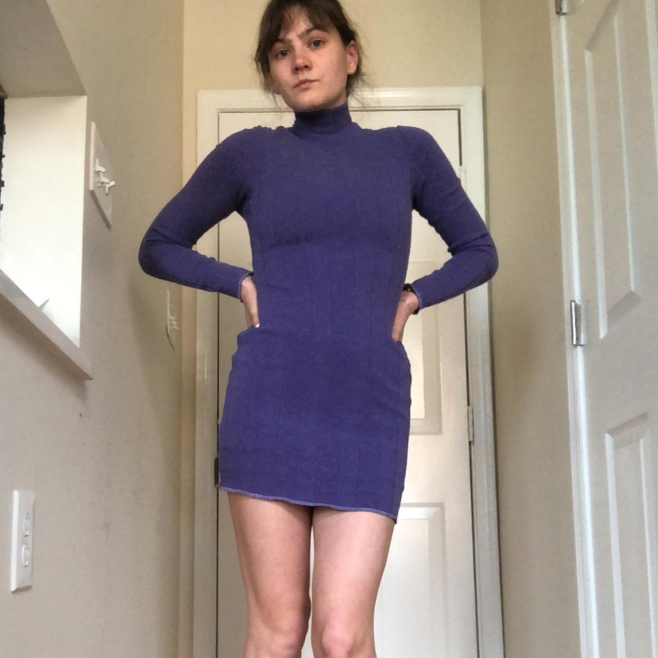 Flattering purple body con mini dress with mock neck... - Depop