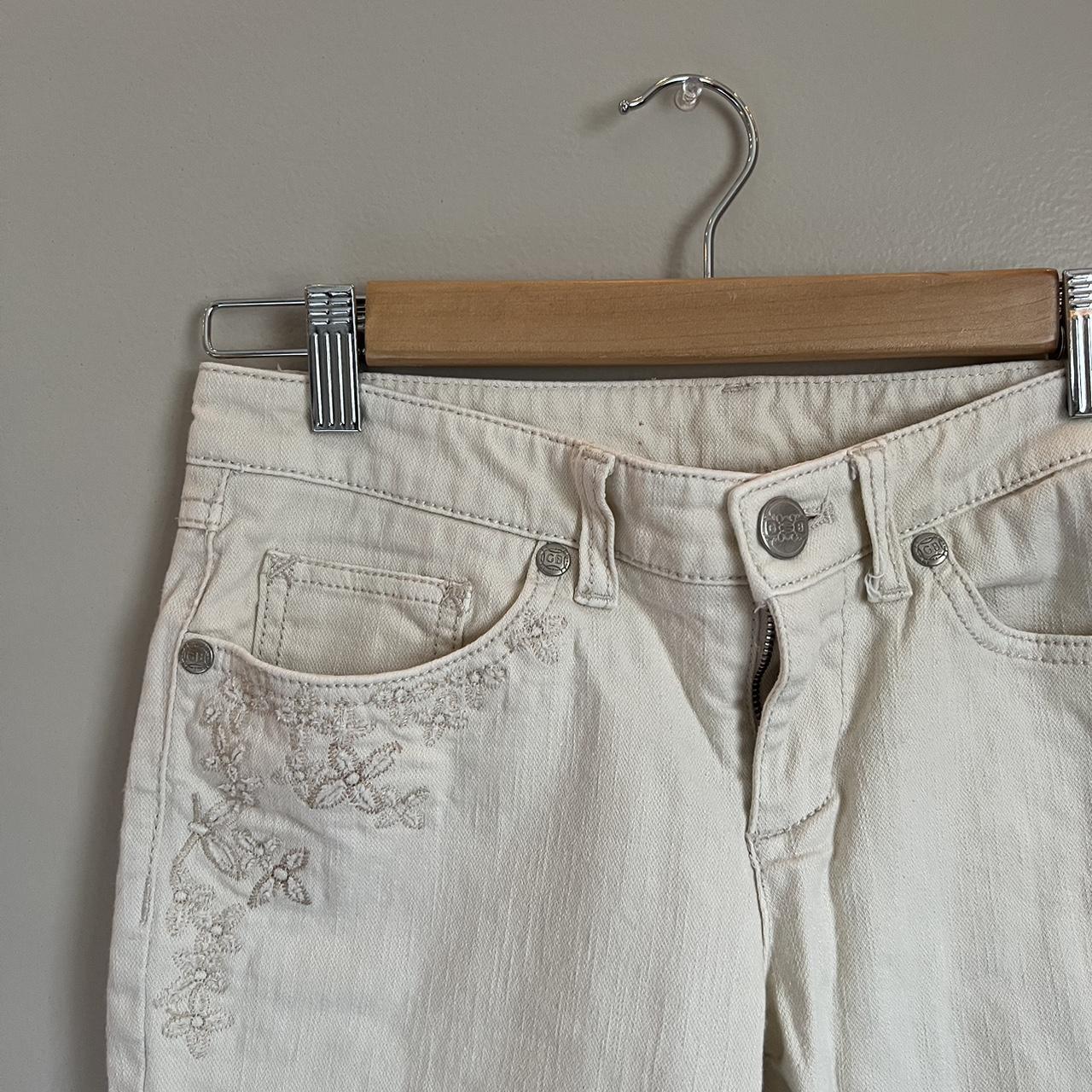 The absolute cutest y2k cream lower rise jean pants....