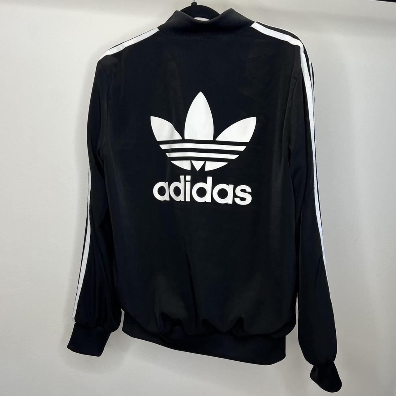 Mens adidas jacket hotsell with logo on back