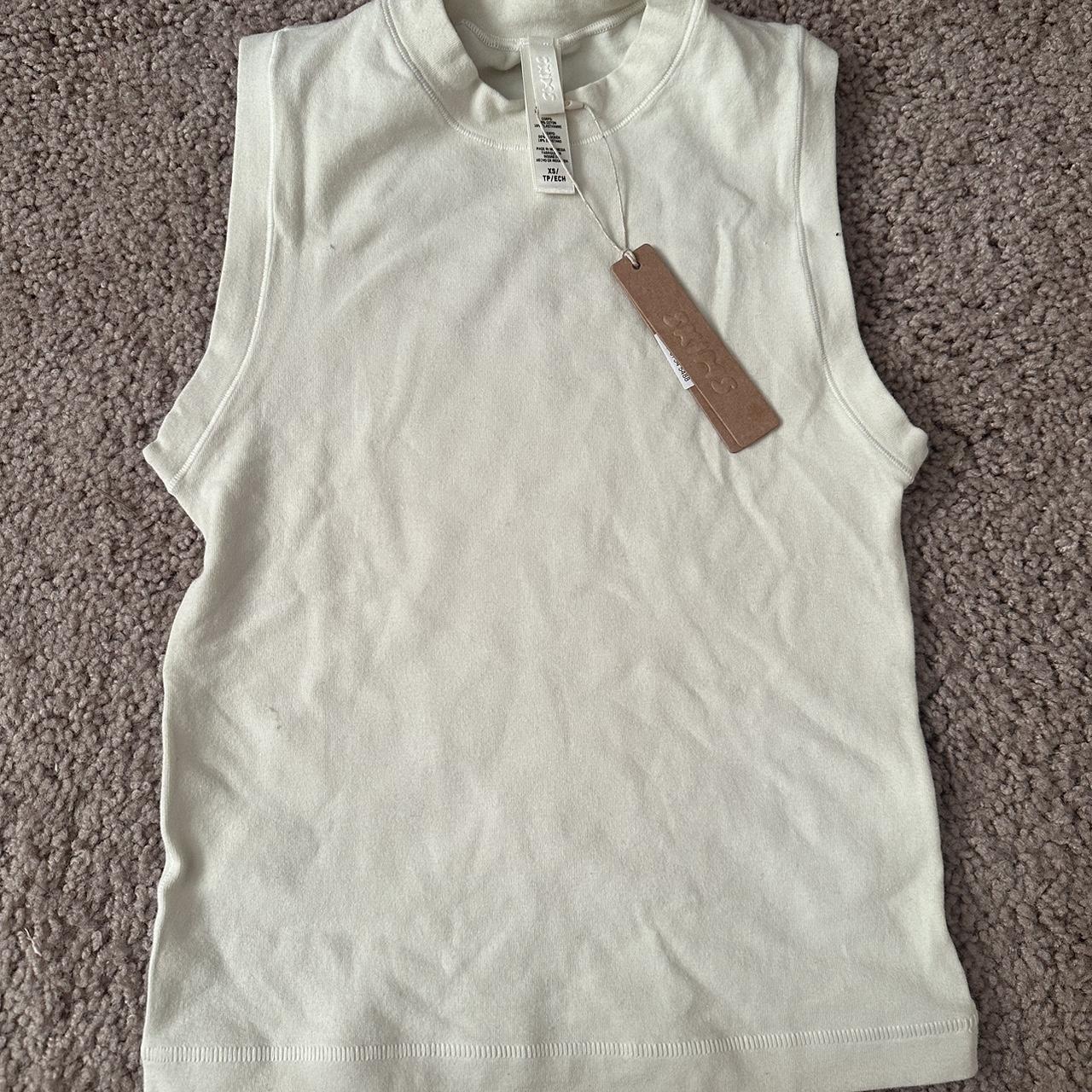 skims mock neck tank top in the color bone size xs - Depop