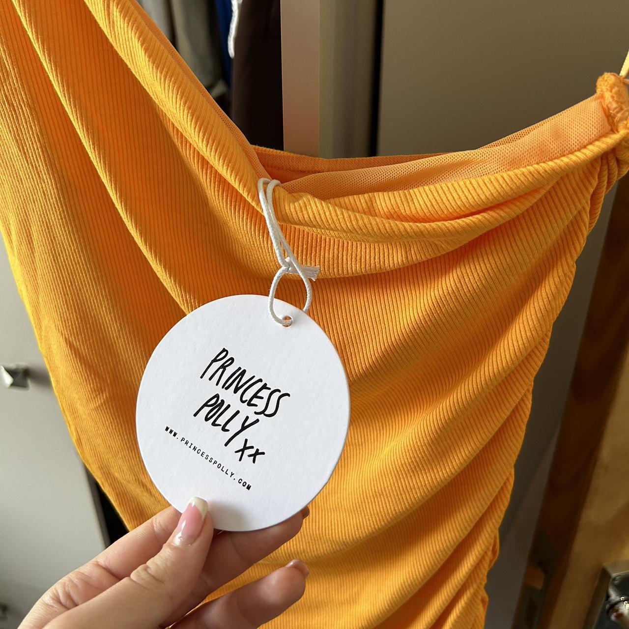 Orange ribbed princess Polly mini dress The colour... Depop