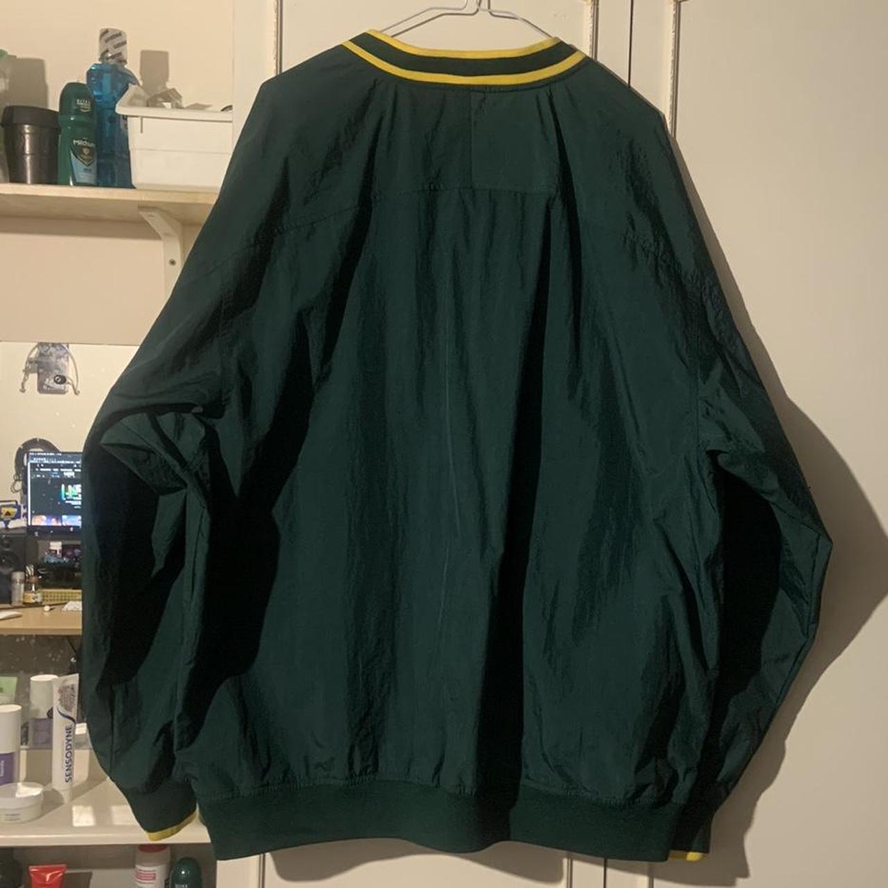 dark green nike windbreaker