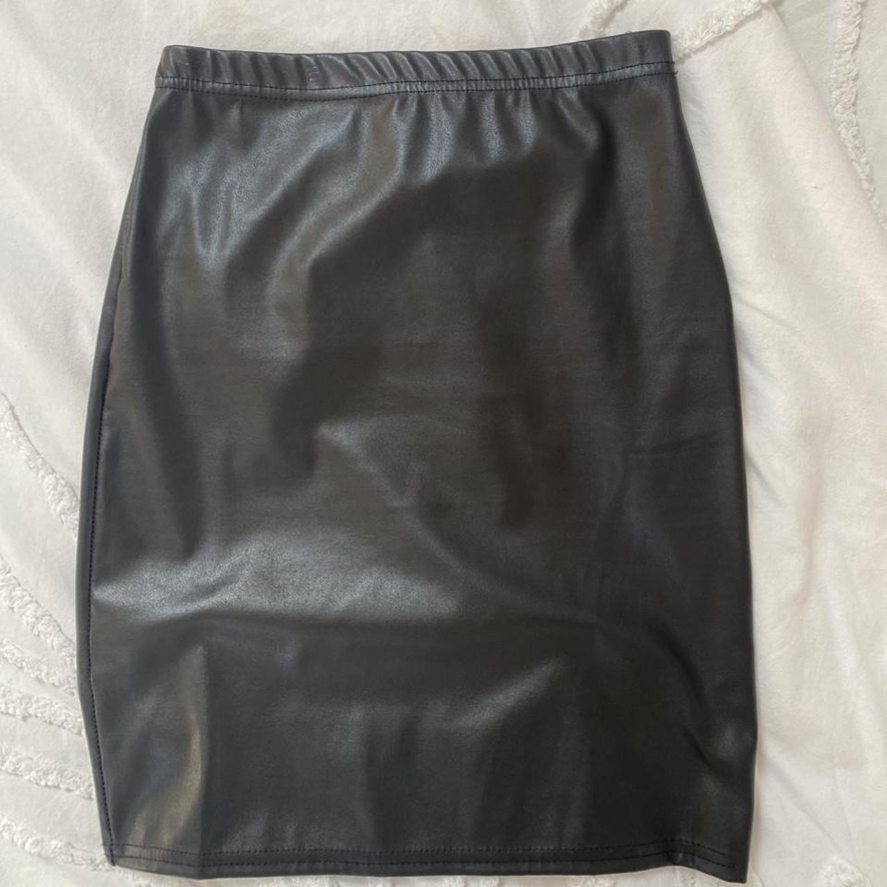 Pretty little thing fake leather mini skirt in black... - Depop