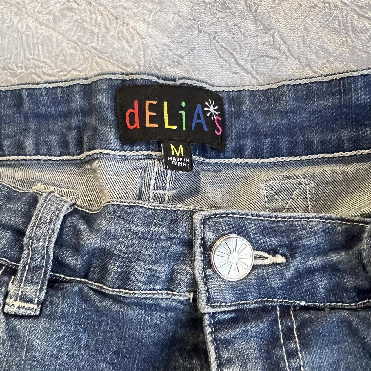 Delias shorts Cute synching detail in the back... - Depop
