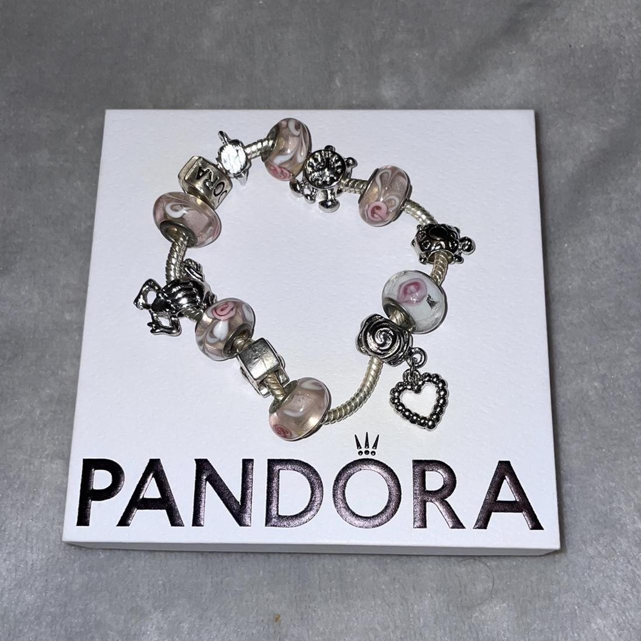 Pandora snake bracelet with charms, great... Depop