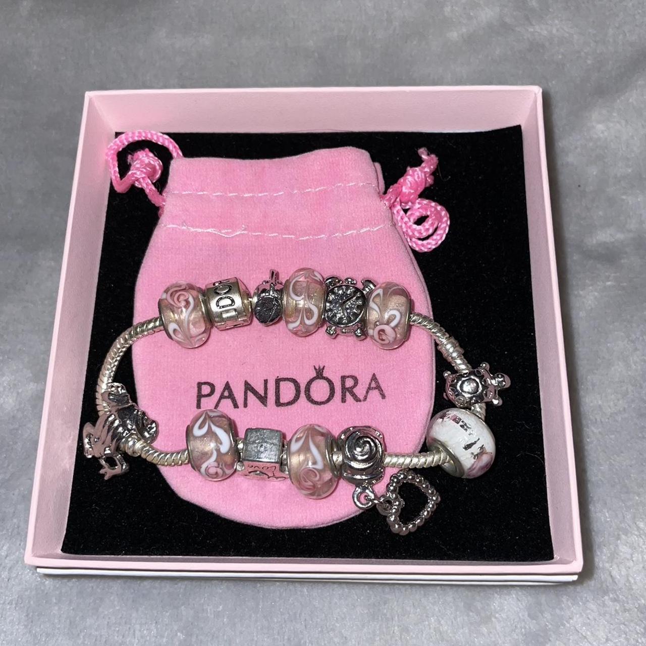Pandora snake bracelet with charms, great... - Depop