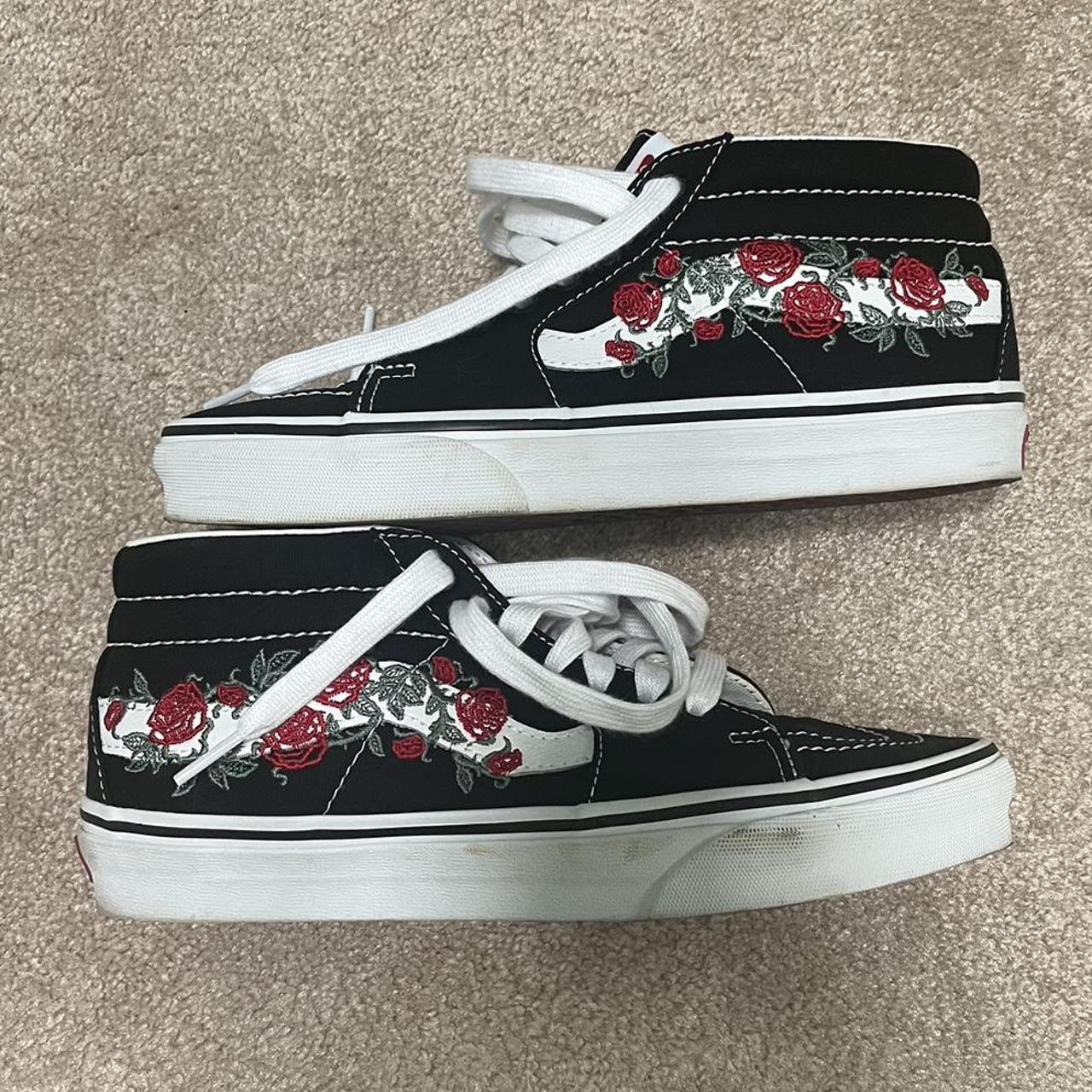 Vans black and white sale with roses