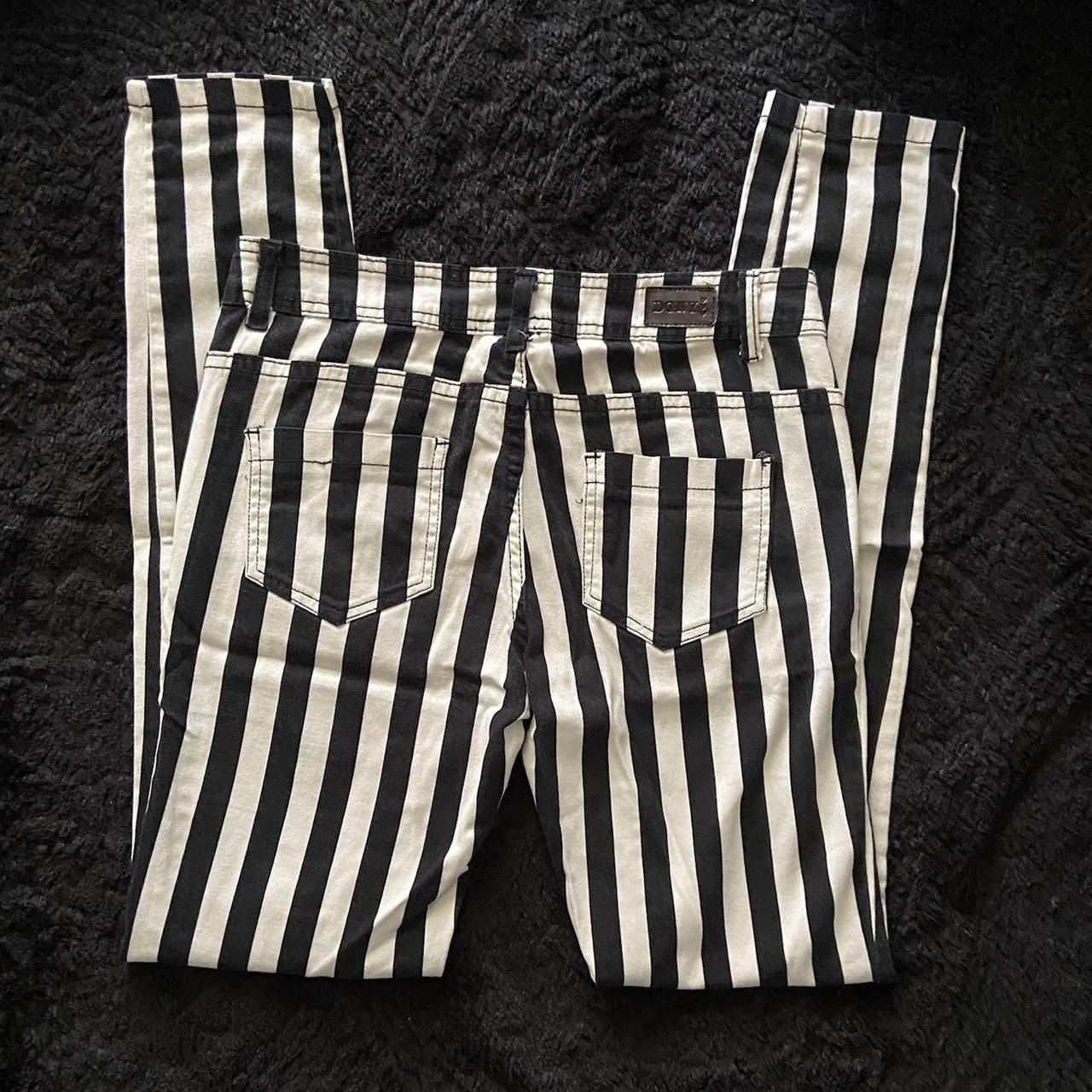 The cutest black and white stripped Beetlejuice low... - Depop