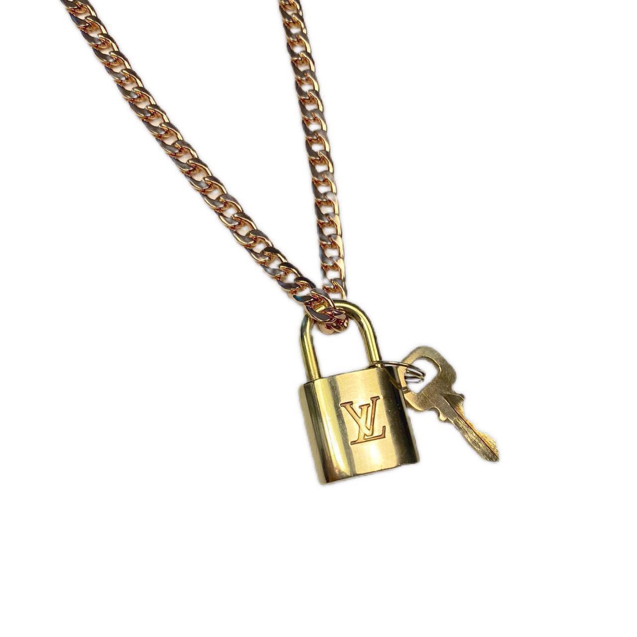 vintage louis vuitton lock necklace on long necklace - Depop