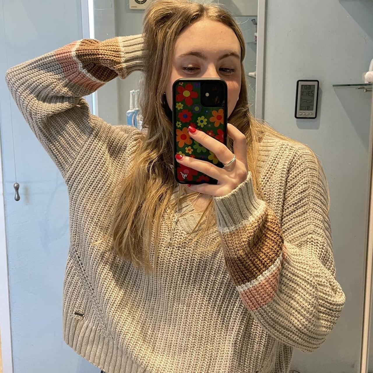 Beige jumper with patterned sleeves Hollister Seen... Depop