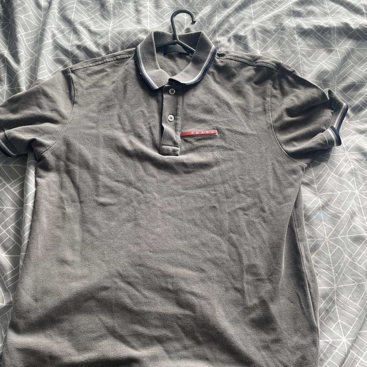 Small mens Grey Prada polo shirt Authentic piece no. Depop