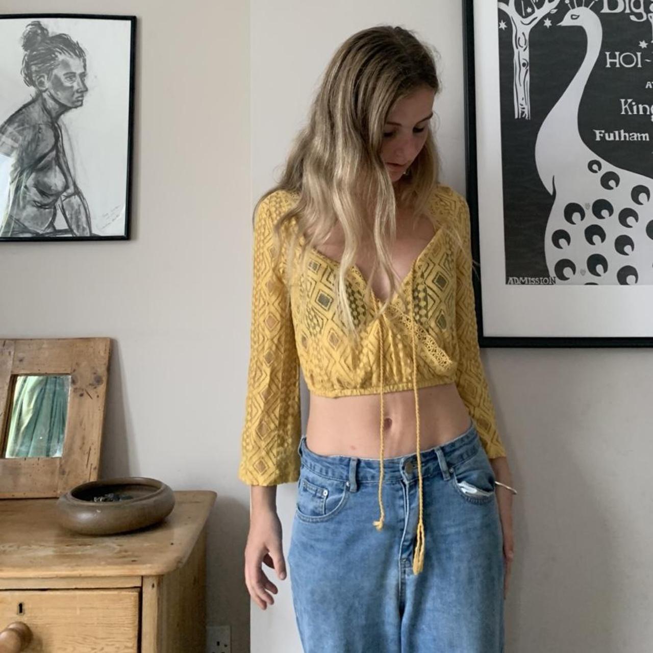 Vintage yellow new look crop top. Label size states... Depop