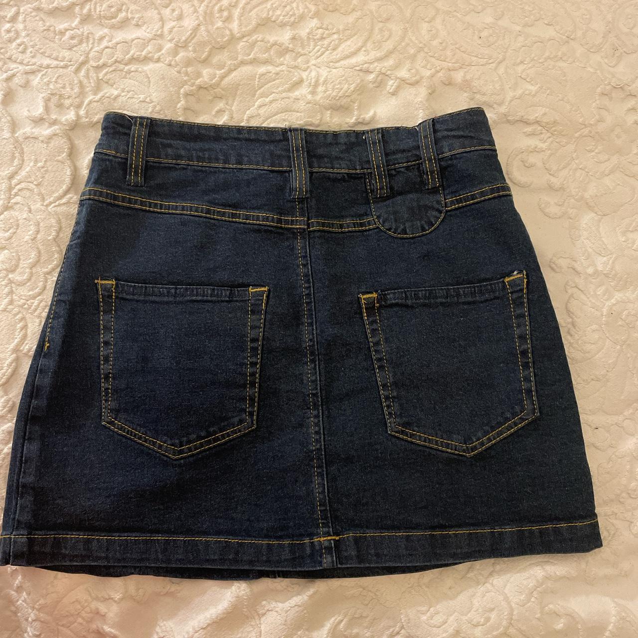 Y2k dark denim mini skirt. The skirt has two front... - Depop