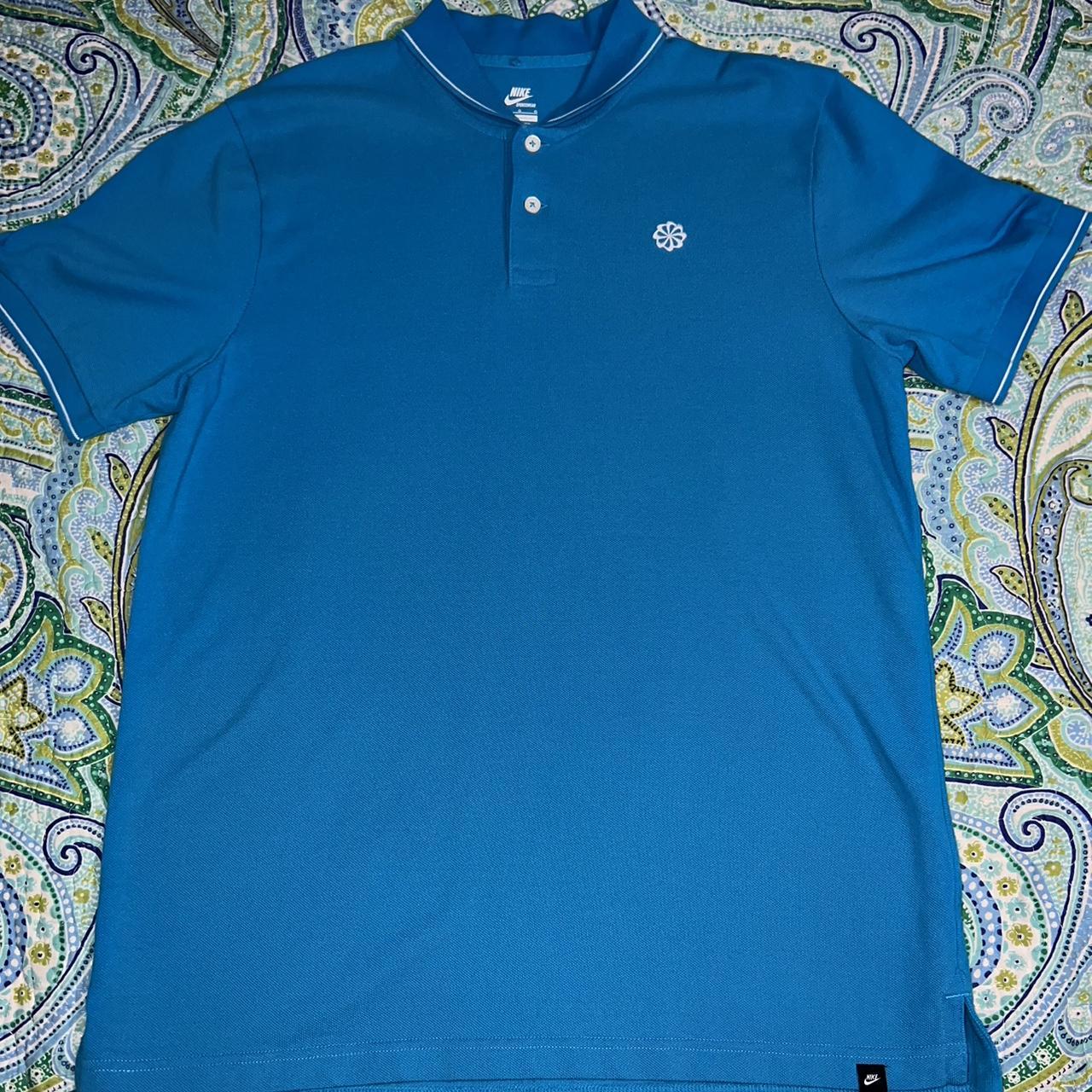 NIKE sportswear polo nice blue polo with a... - Depop