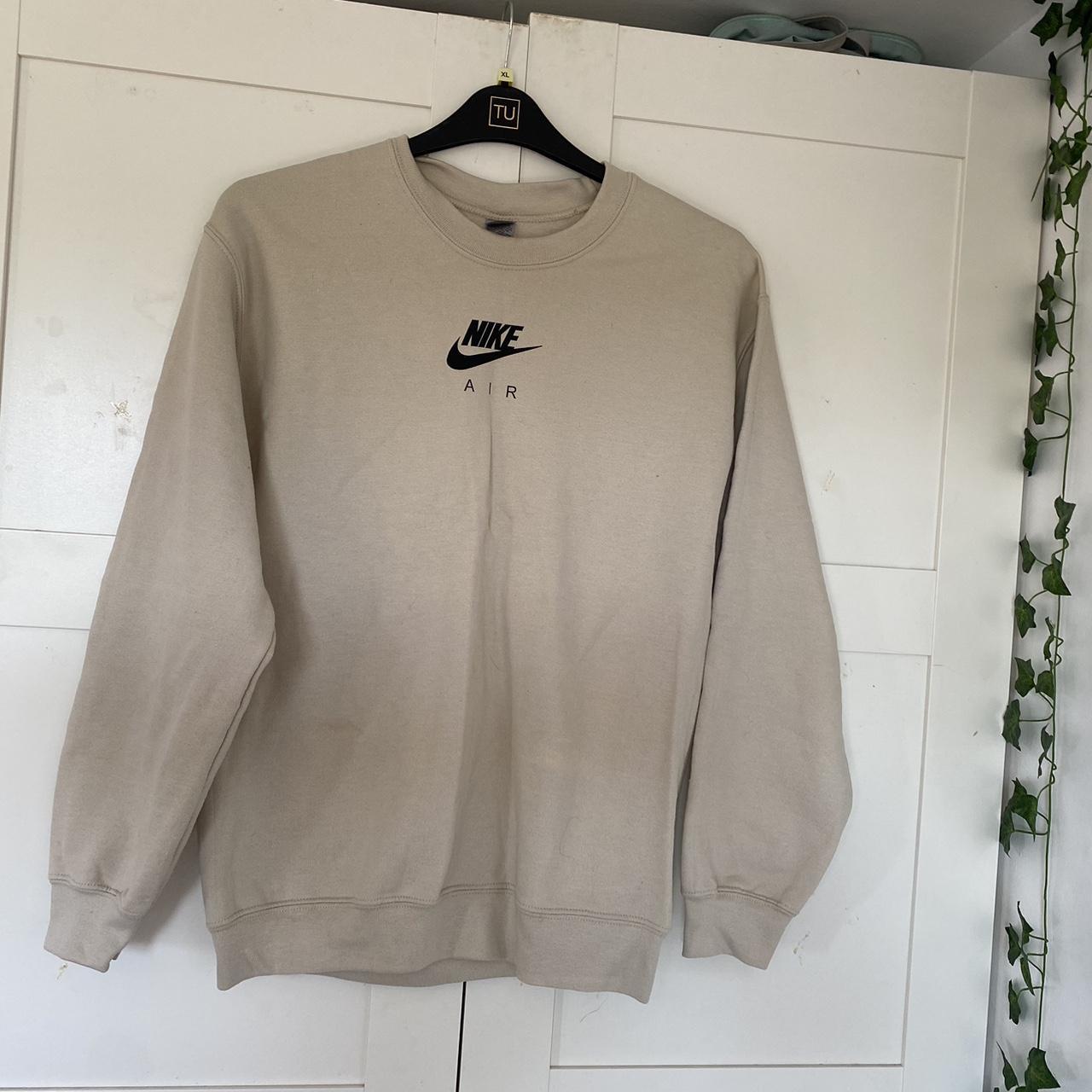 cream nike top