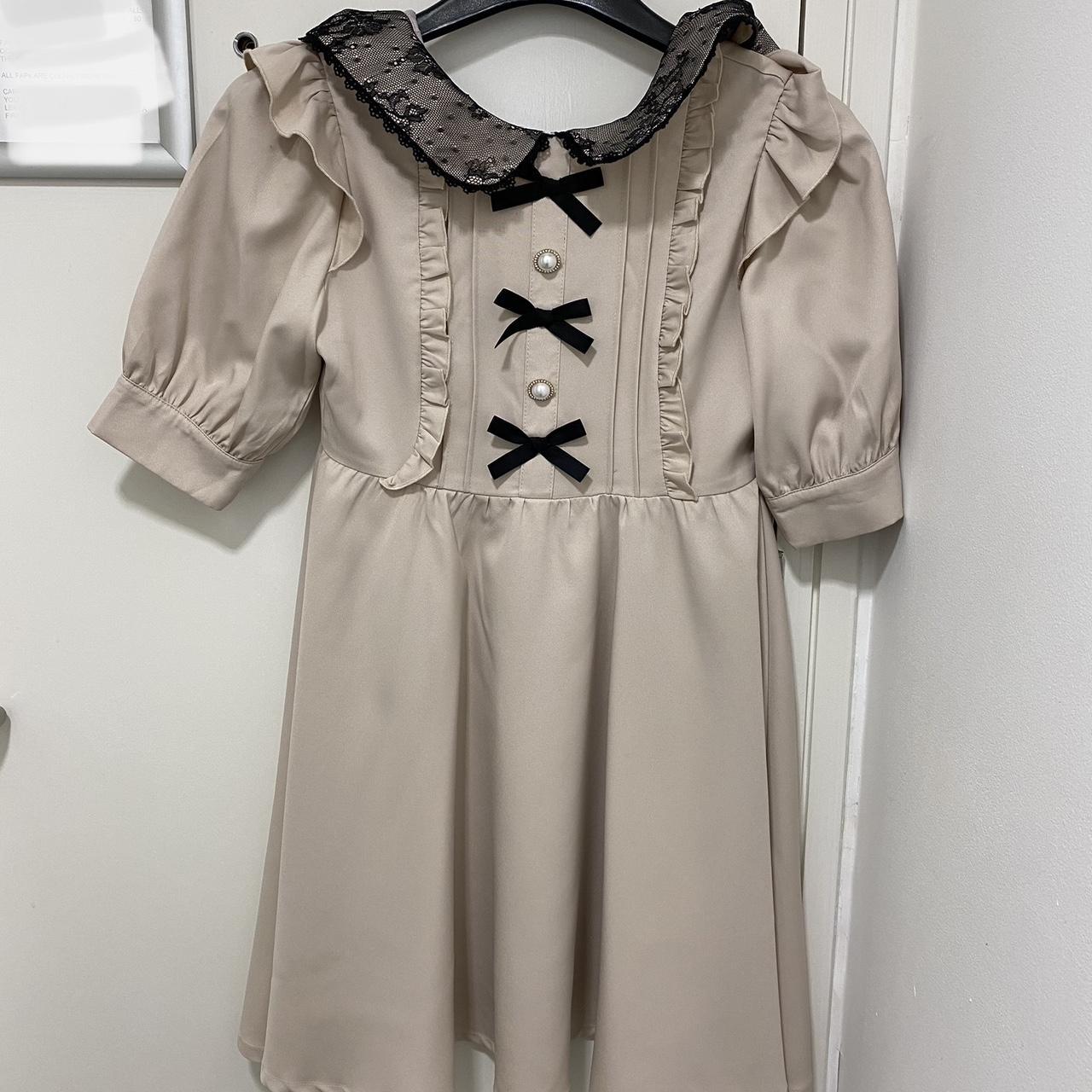 ROJITA mini babydoll dress in a pink/beige... - Depop