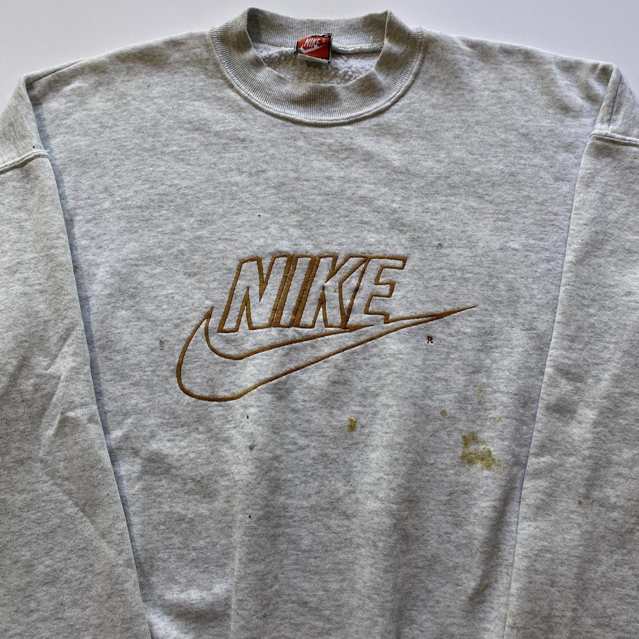 Cream vintage best sale nike sweatshirt